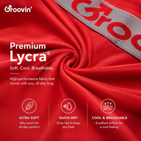 Close-up of red Lycra fabric with Groovin' logo and text advertising Premium Lycra: Soft, Cool, Breathable, plus Ultra Soft, Quick-Dry, Cool & Breathable icons at the bottom.